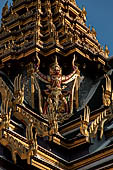 Bangkok Grand Palace,  details of the tiered roof and the tiered spire of the Maha Prasat throne hall. 